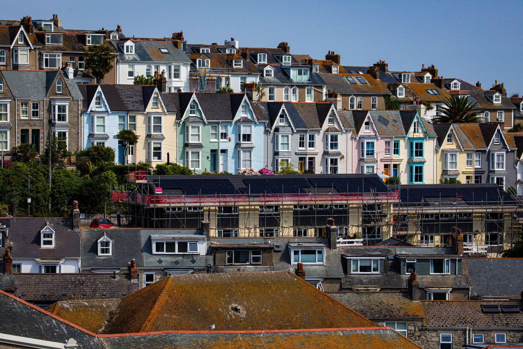 Scaffolding on a terrace of houses during roof renovation work